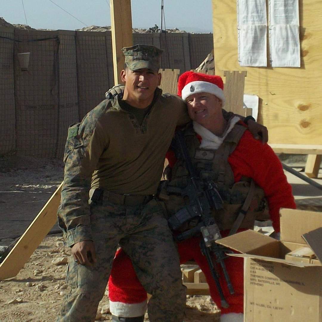 USMARINEMOMx5's tweet photo. My oldest son Philip on his last Christmas with Sgt Major Larry Joe Harrington❤️ With the 1/6 in  Afghanistan 2011. Oh how I love this handsome man so much...
#MarineCPLPhilipMcGeathKIA
#onesixhard
#McGeathMarines https://t.co/xpj1vNGGei
