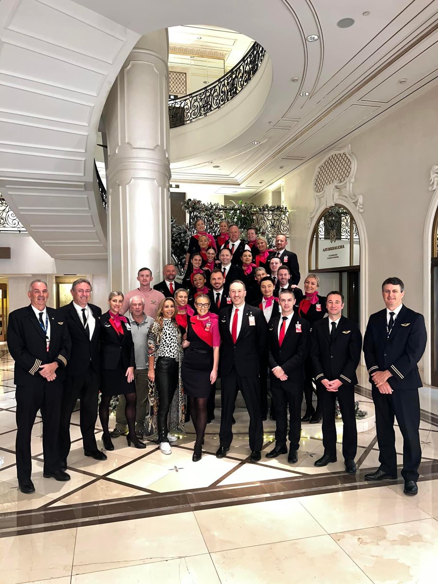 gabisaper's tweet photo. My mum (crew) and stepdad (captain) + the rest of the QF1 crew together for an unexpected Xmas day photo in Baku, Azerbaijan. Happy that my stepdad made the call of safety over risk by diverting and landing safely, albeit inconvenient. Now on the way to #LHR. 
#baku #Qf1 #Qantas https://t.co/vrOjay7A1K
