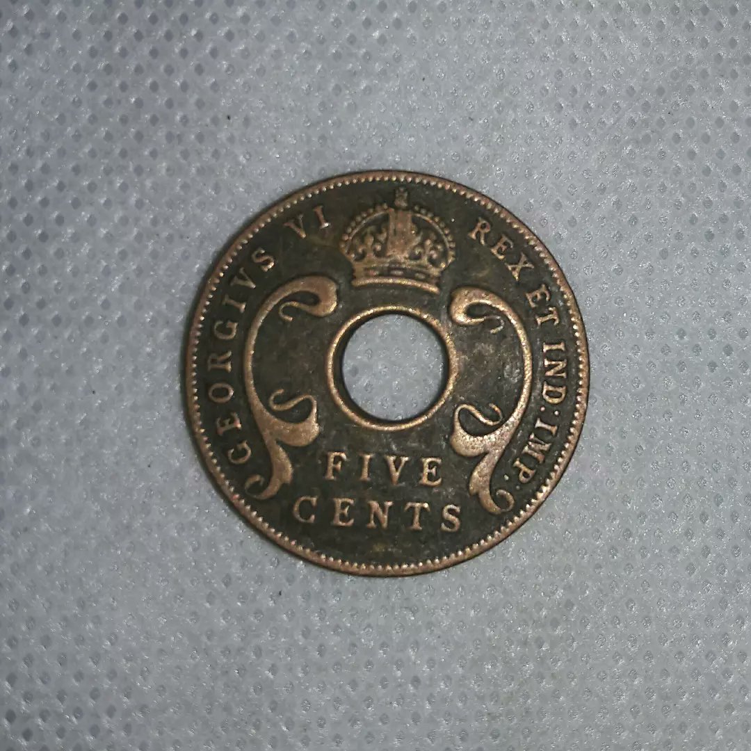 Old coin from Africa King George VI Five cent coin 1942 Royal mint London Coin on sale. #Coinshops #Africamuseum #collectors #numismatics #coins #pawnsstars #coinonsale #shopnow #historians #museums #archaeologist #Wessex #BuckinghamPalace #Africa #history