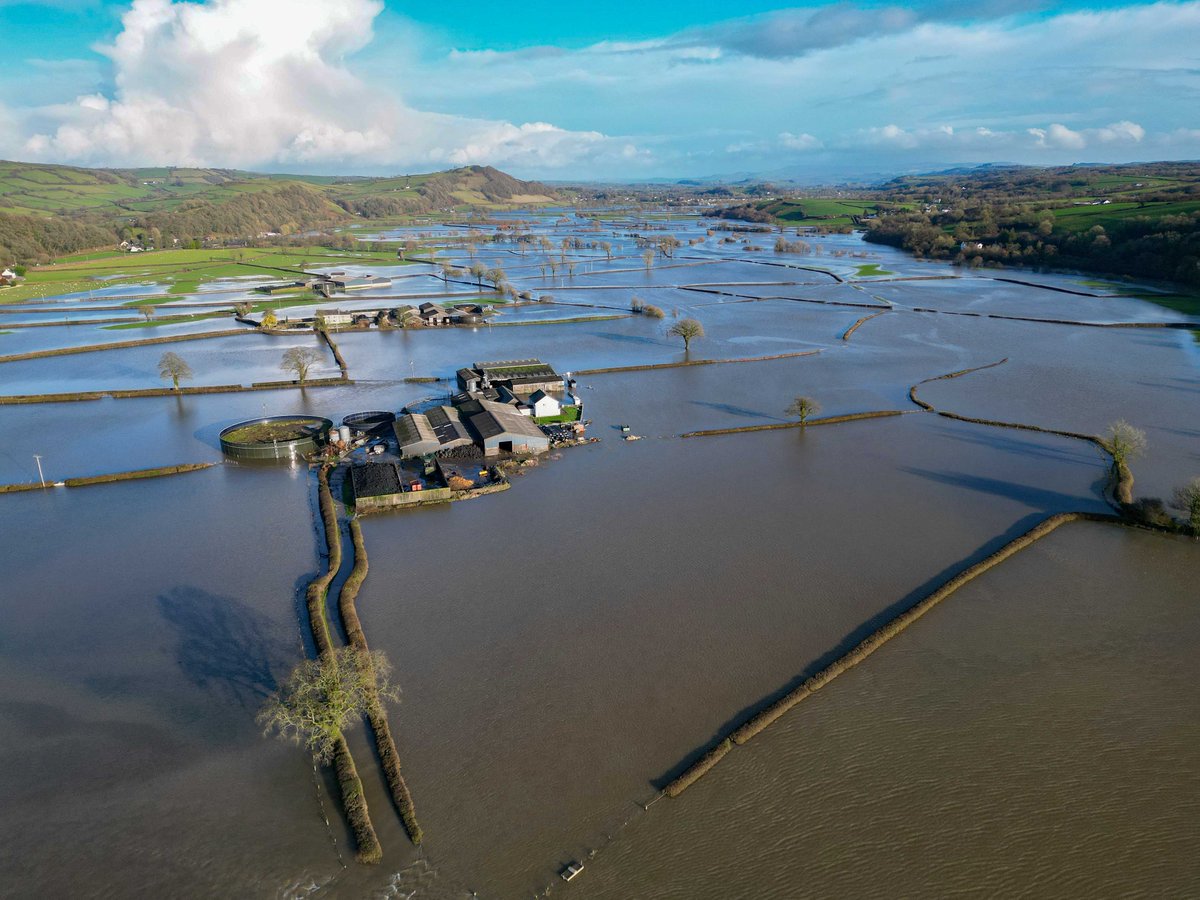 A farm surrounded by flood water in the Towy Valley, Carmarthenshire. #flooding #floods #wales #uk #photography #drone #carmarthenshire
