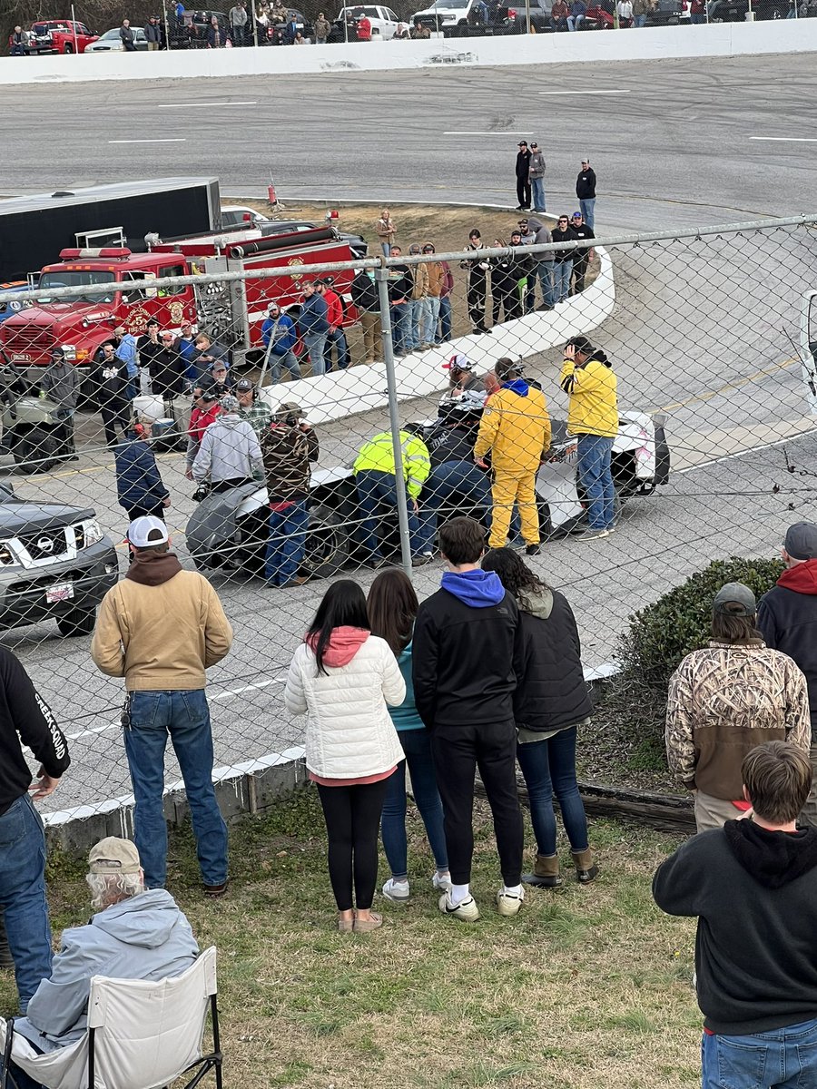 Scary crash at the #NewYearsBash as Ant Kohler goes airborne and nearly over the pit wall. Driver is awake and alert and talking to rescue team.