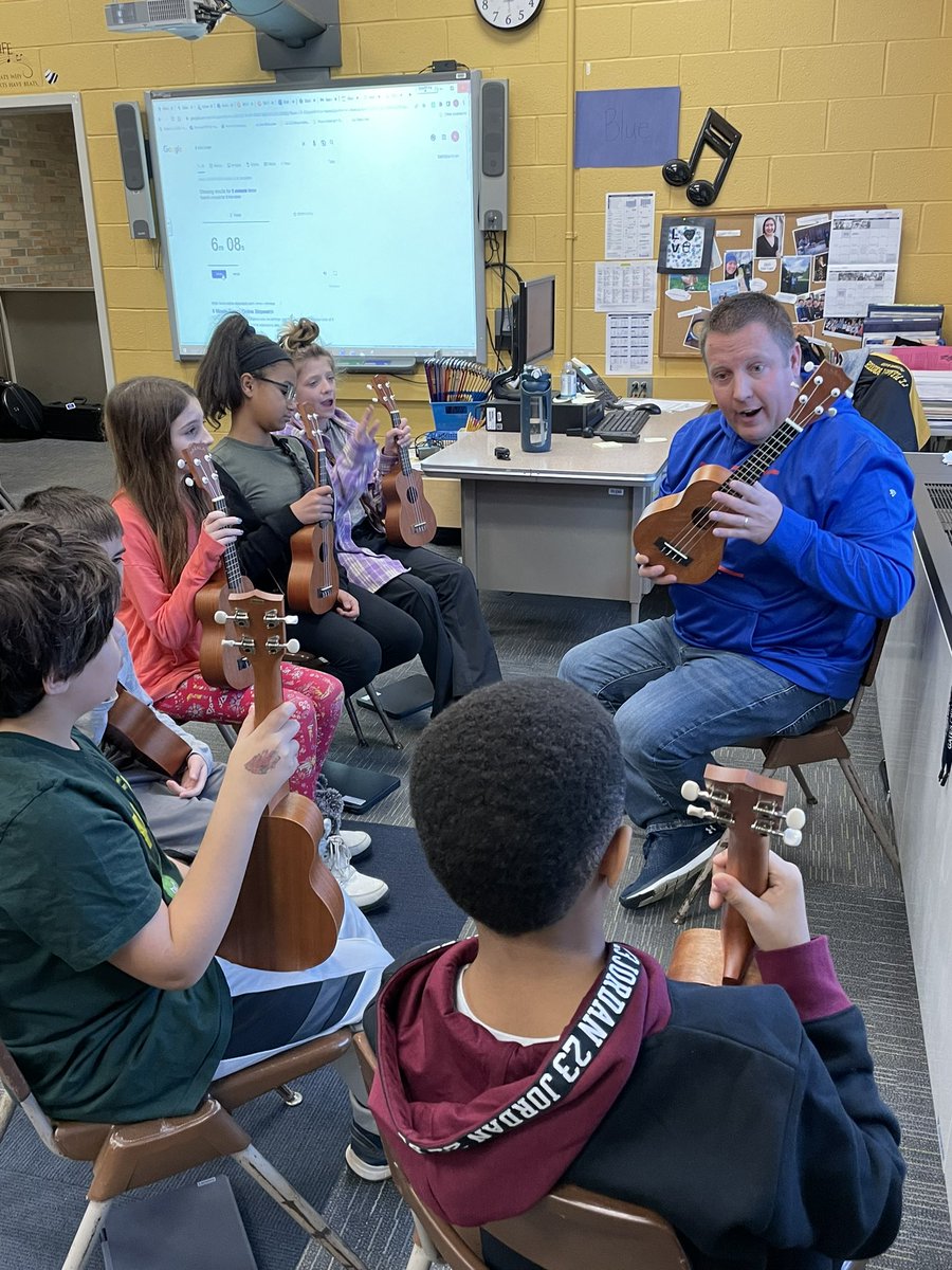 PaulRoadSchool's tweet photo. Fifth-grade is having a great time learning about the ukulele in music class! It is music to our ears! 🎶 Shout out to our instructional coaches for their help! @MikeMunski @mrharv20 @wendy_taylor10 https://t.co/8k1Upm802l