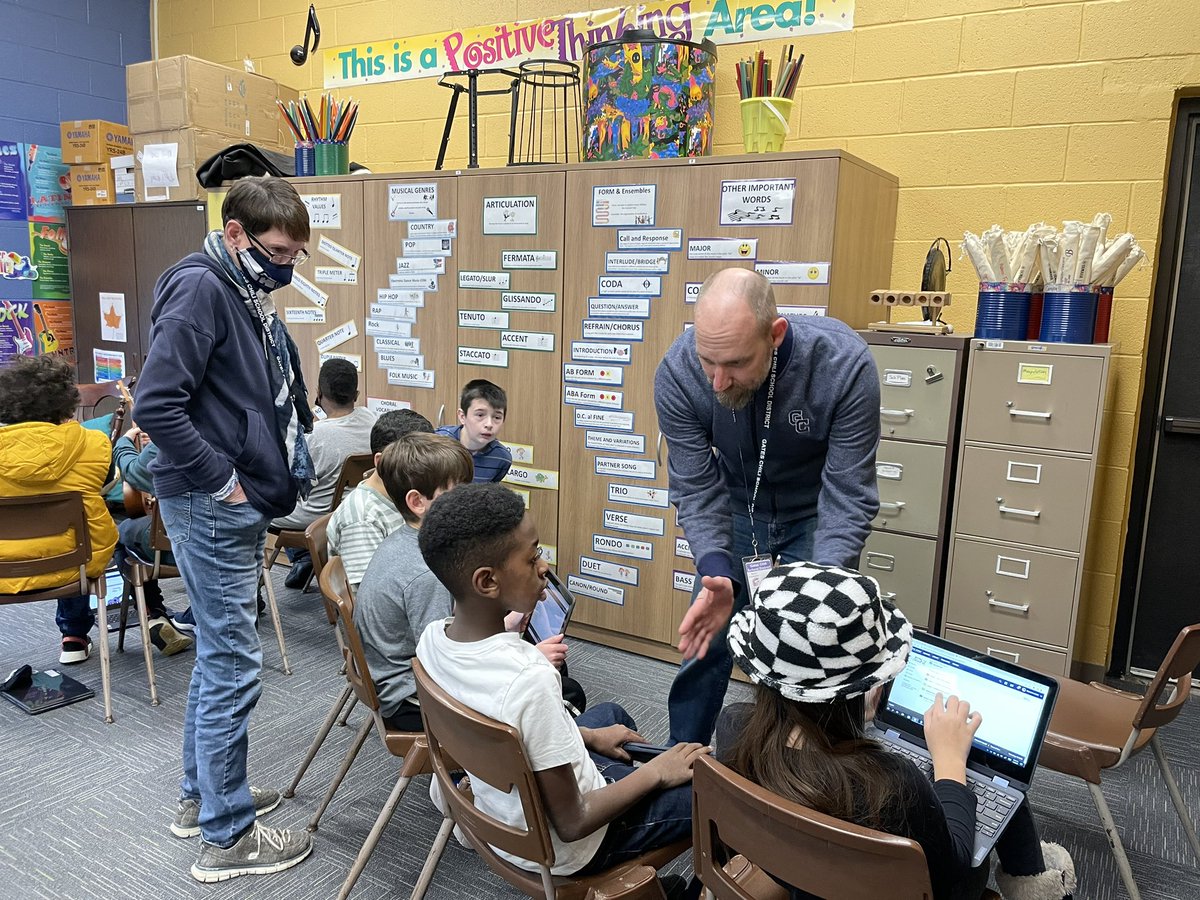 PaulRoadSchool's tweet photo. Fifth-grade is having a great time learning about the ukulele in music class! It is music to our ears! 🎶 Shout out to our instructional coaches for their help! @MikeMunski @mrharv20 @wendy_taylor10 https://t.co/8k1Upm802l