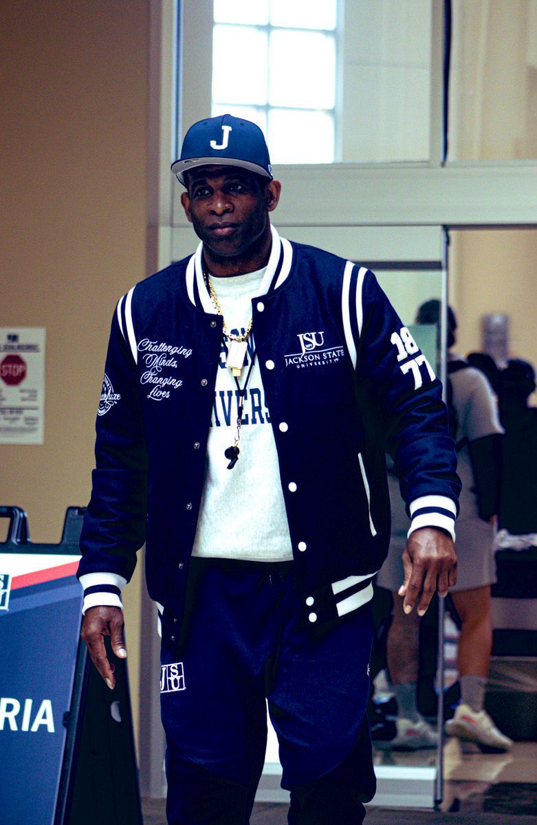 JostensCCS's tweet photo. Even Coach Prime sports his athletic letter jacket! If you have earned it go design and order it! https://t.co/DrwGNkDqdX is the spot to do it! @TraceyPEvans2 https://t.co/AoYBSMnpIv