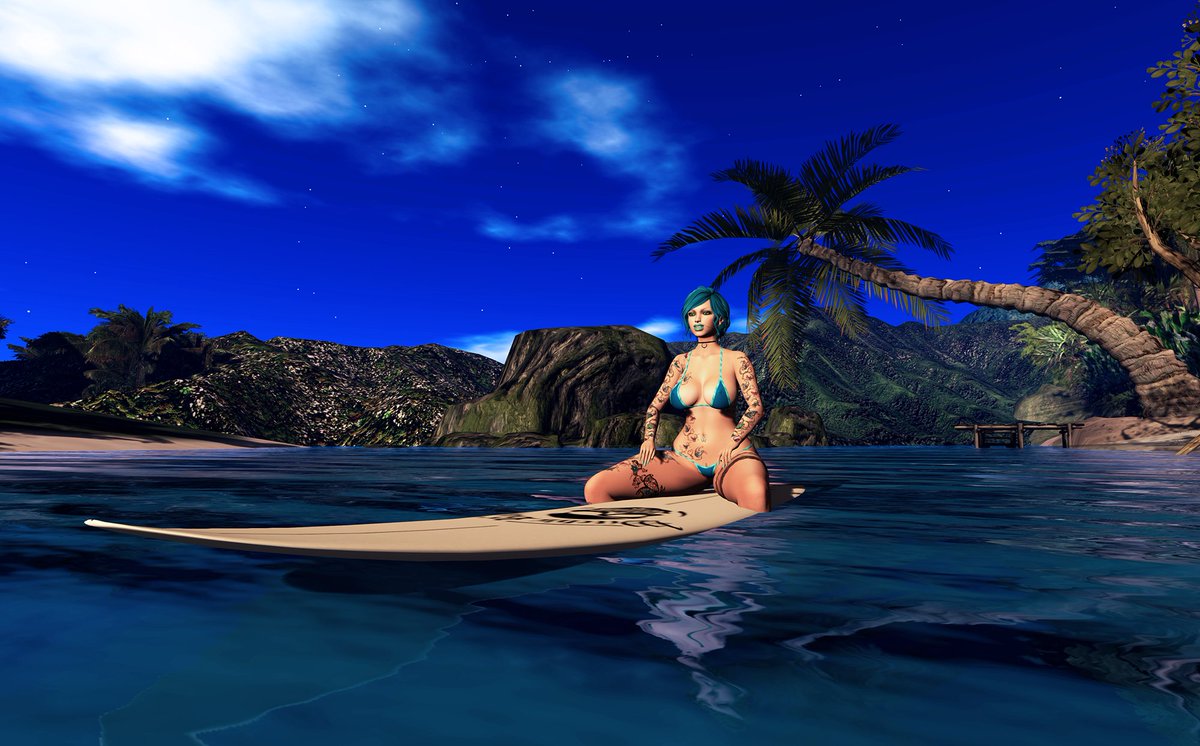 Went to a spot where I could try out surfing, but just hung on the board watching the waves. Going to have to get lessons so I don't kill myself! 

#SecondLife