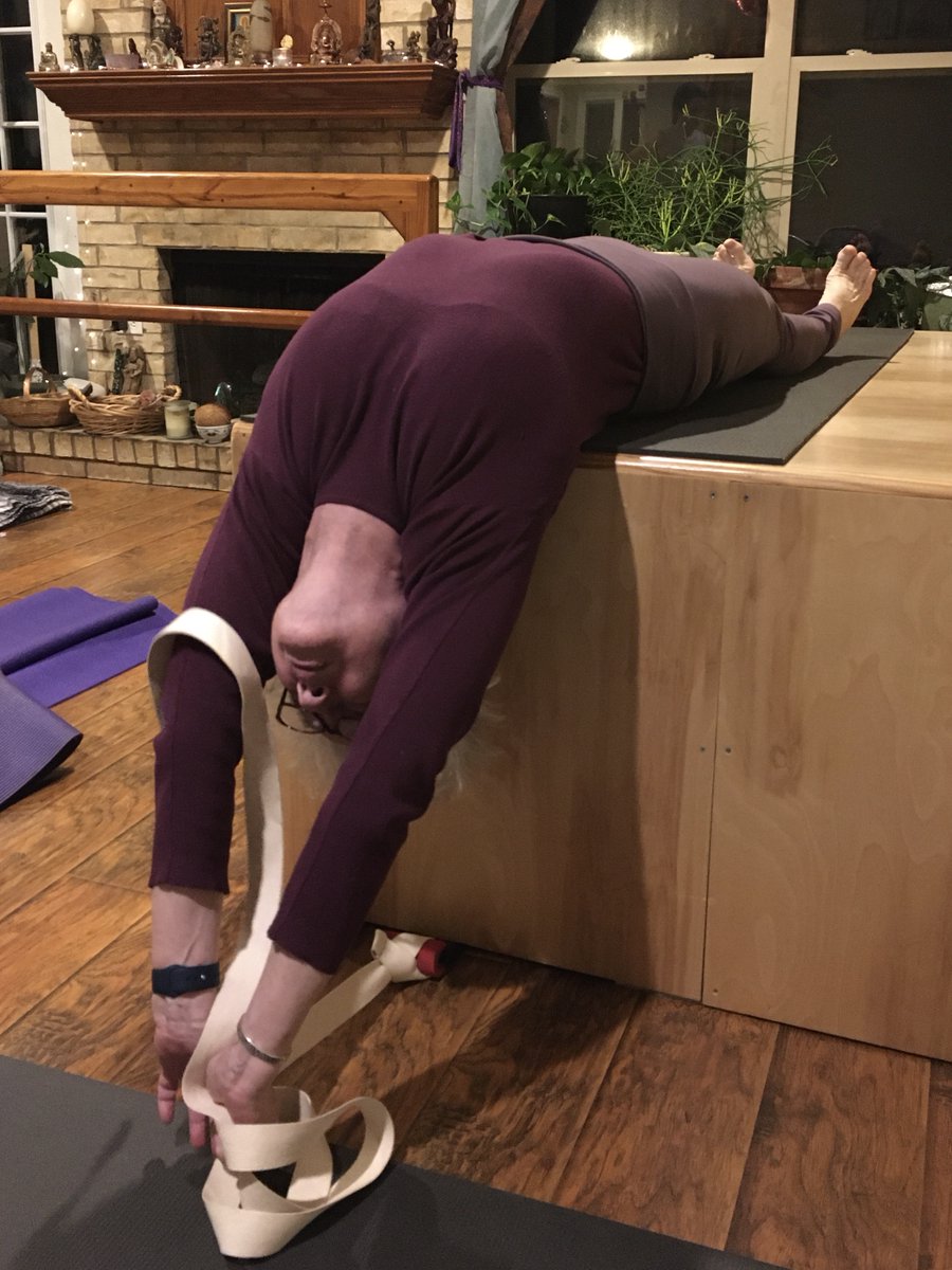 Backbend energy! Start this Dwi Pada Viparita Dandasana prep with the bottom 1/3 of the shoulder blades on the platform. Pull the shoulder blades toward the front of the body and away from the head; continue that as you inch off the platform vertebra by vertebra. #IyengarYoga