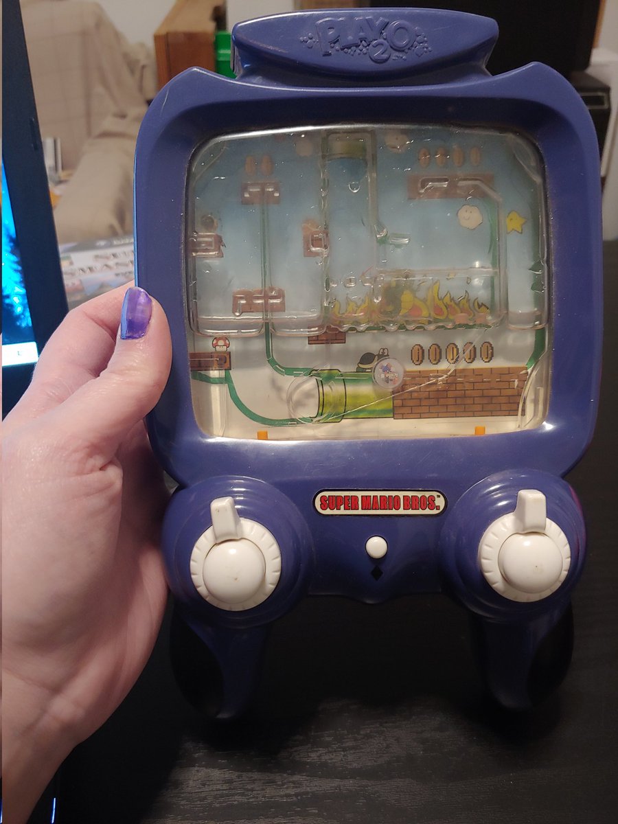 Odd stuff in my collection. Super Mario Bros Nintendo water ring toss game.. I have a pokemon one too