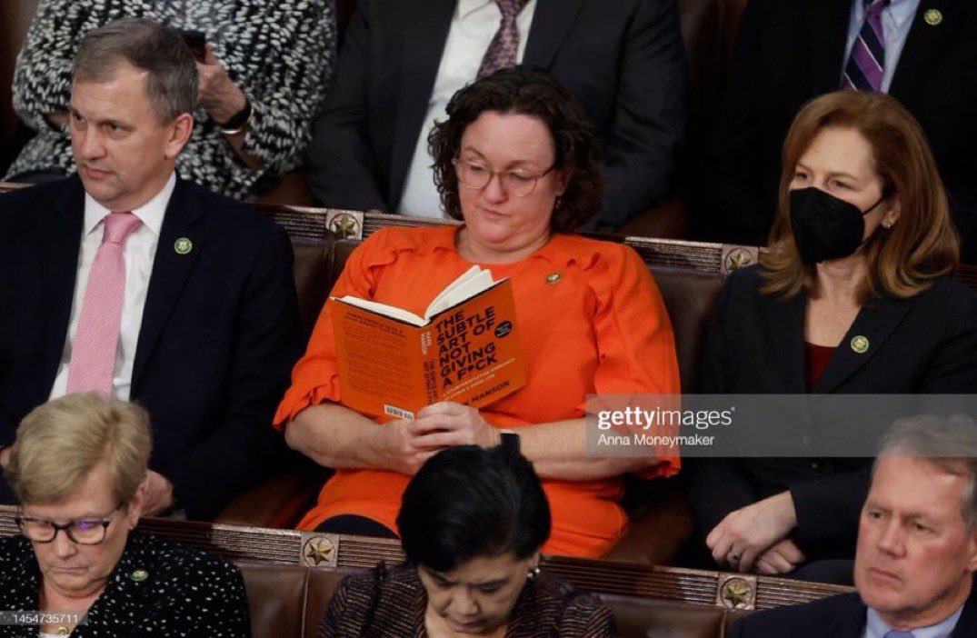 JDCocchiarella's tweet image. Katie Porter is reading “The Subtle Art of Not Giving a F*ck” while Republican chaos ensues on the House Floor.

Katie Porter is an icon🧡