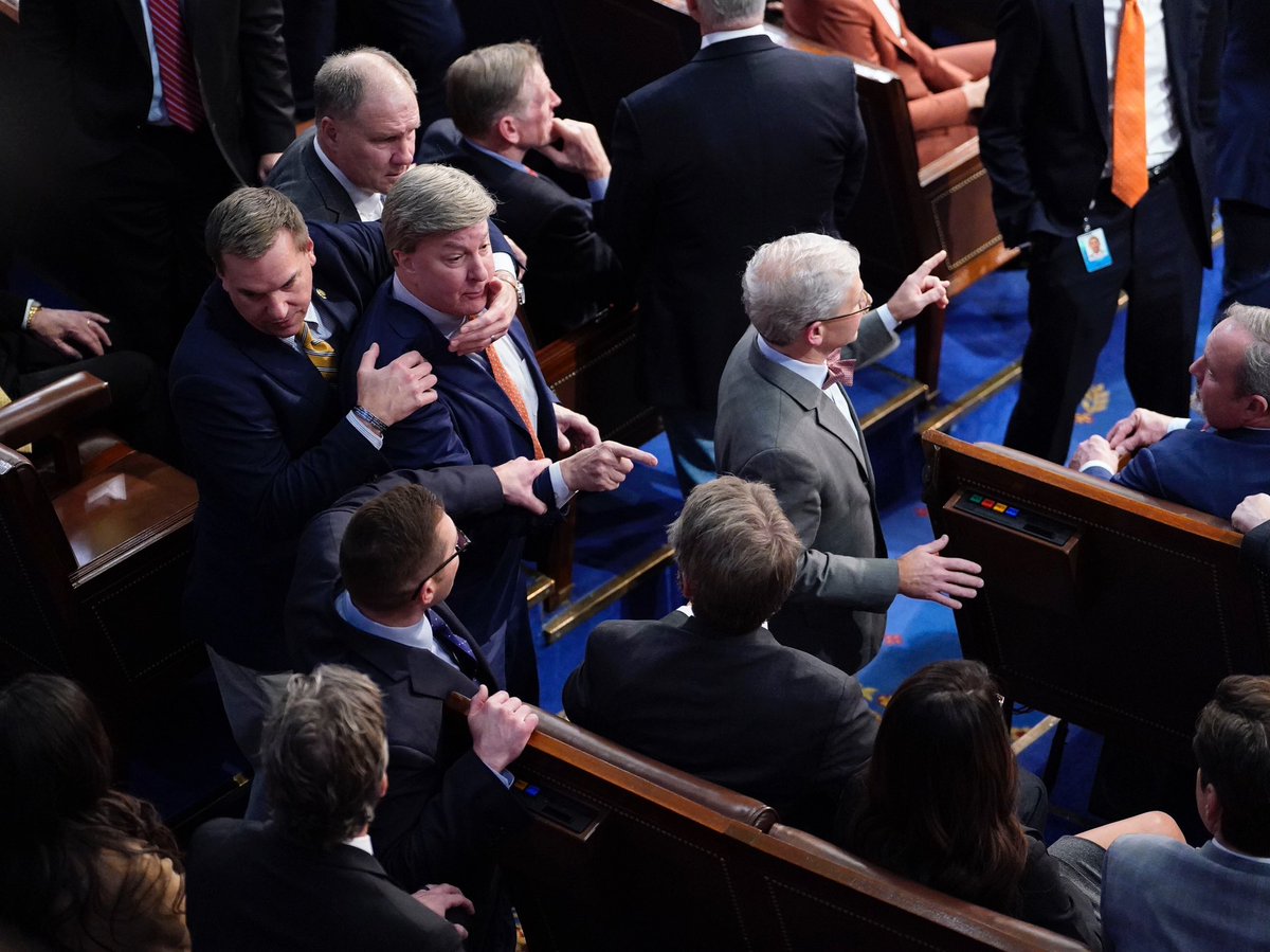 Mike Rogers (R-AL) is restrained after getting into an argument with Matt Gaetz (R-FL) during in the 14th round of voting for speaker in a meeting of the 118th Congress, Friday, January 6, 2023, at the U.S. Capitol in Washington DC.