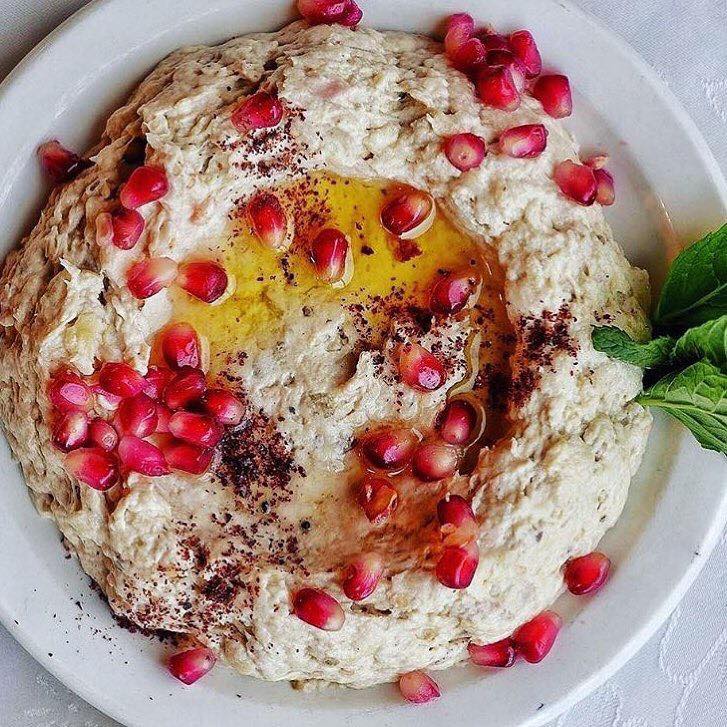 axisdmc's tweet photo. One of the yummy appetizers to taste when in Jordan is Motabbal. A puree like mix of
roasted aubergines with tahini paste, olive oil and lemon juice.
#mutabal #arabianfood #food #babaganoush #healthyfood #delicious #yummy #vegan #eggplant #salad #restaurant #pomegrenate #jordan https://t.co/q2hSg7rjVP