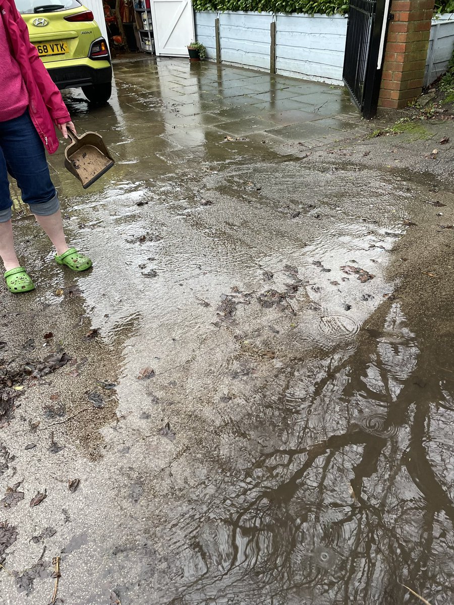 Angegeorge46's tweet photo. Whilst out of my run this morning I stopped and spoke to this lady trying to clear her driveway, apparently happens All the time! Every time it rains water flooding into her driveway and garage from Green Lane North. Sort the drainage out @TraffordCouncil https://t.co/RaDMIRih1B