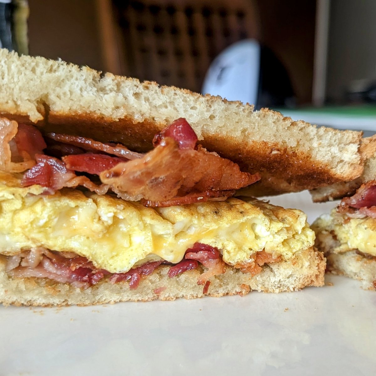 Do love a good breakfast sandwich! Double bacon with cheesey eggs served between toast spread with thick butter. Simple yet delicious!

#sandwich #bacon #baconandeggs #baconsandwich #butteredtoast #breakfast #breakfastsandwich #cheeseyeggs #toastedsandwich #loveagoodsandwich