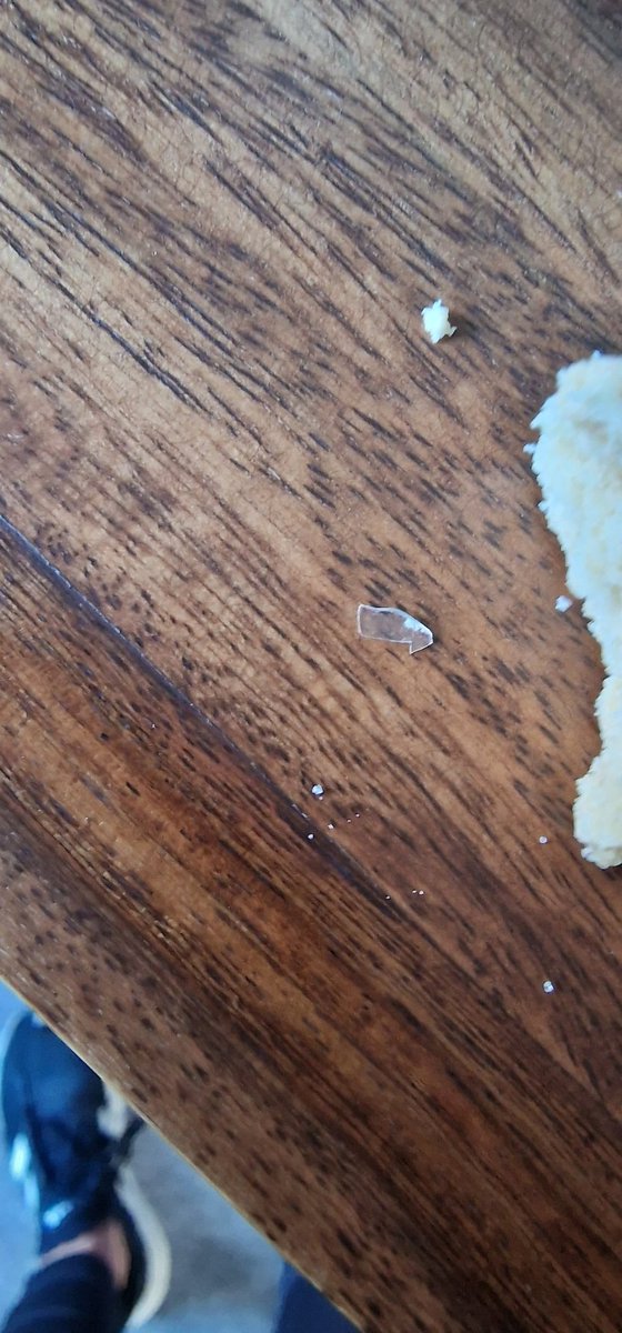 hebush75's tweet photo. @Tesco we are finishing a box of your finest shortbread. My daughter was eating a finger shortbread when something crunched that shouldn't have. There is a small slither of glass like a flat splinter within the biscuit. She removed it but it cut her tongue slightly. Please advise https://t.co/mU3UgvnYHV