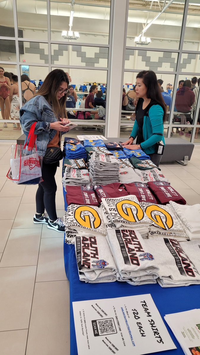 Swim team parent shirts for sale in the lobby!