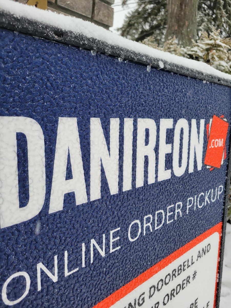 It's so cold that our sign froze over...why did I open a shop in Canada? 😂