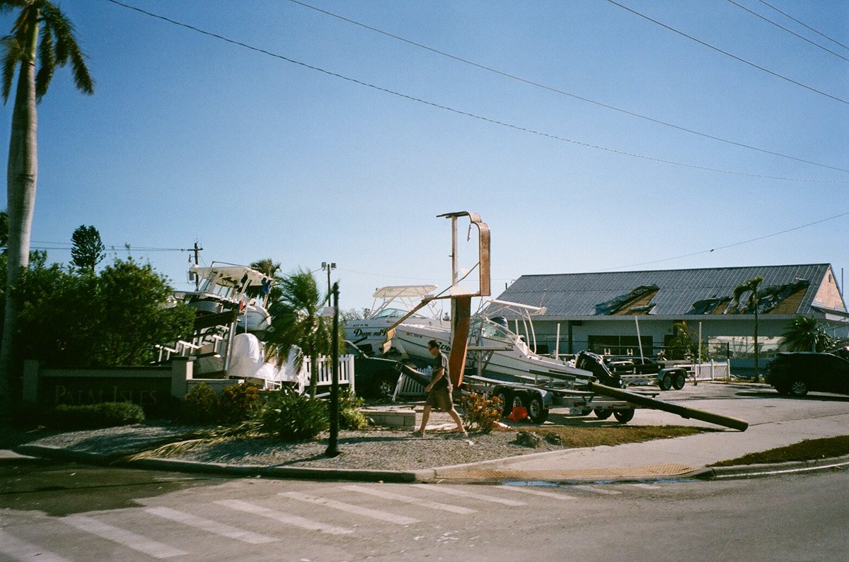 _cristianrivera's tweet photo. went to #FortMyers last year to help bring supplies to those in need after the damage caused by #HurricaneIan.

such a heartbreaking thing to witness &amp; easily some of the most challenging photographs i've ever taken. 💔

#35mm #florida #photography #film https://t.co/BLODW0XYDi