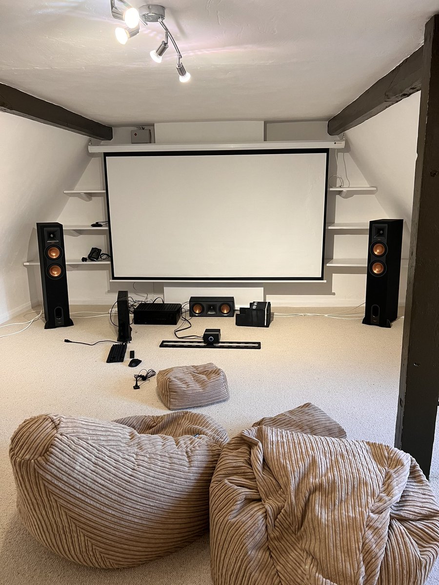 The attic.. it works for now 😆 Think we might put a false wall at the end with a short throw projector, ceiling is too low for anything else 🤪