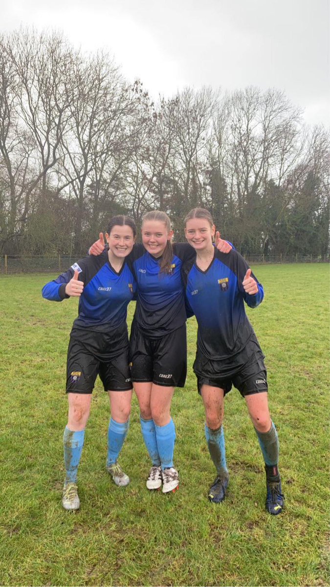 Just a bit wet 😂 Our U18s are still smiling after a real soaking!!