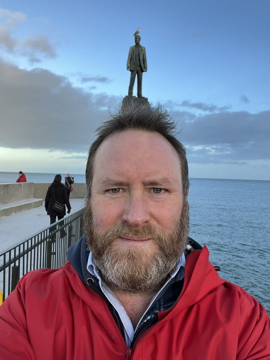 CormacKinsella's tweet photo. There’s something on my head!! 😉 #statue #rogercasement  #dunlaoghaire #nicedayforawalk https://t.co/ZaLrTIjE5g
