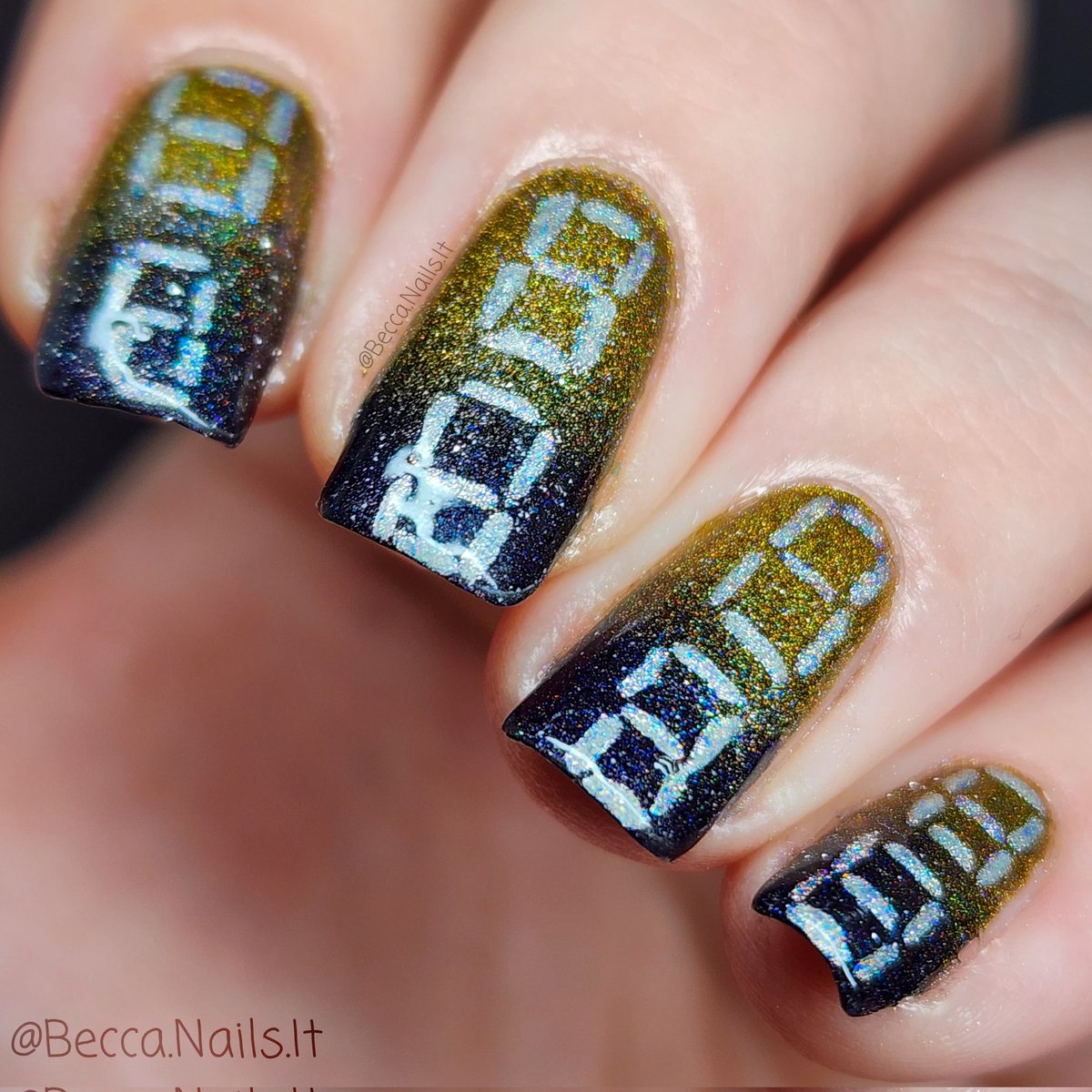 BeccaNailsIt's tweet photo. Here is my #HoloTacoNewYear2023 Nail design! My goal is to improve on my line work this year. So I went with the line work of a digital clock to tell you what time it is!☺️ @holotaco @nailogical https://t.co/BOzQh0WGDw