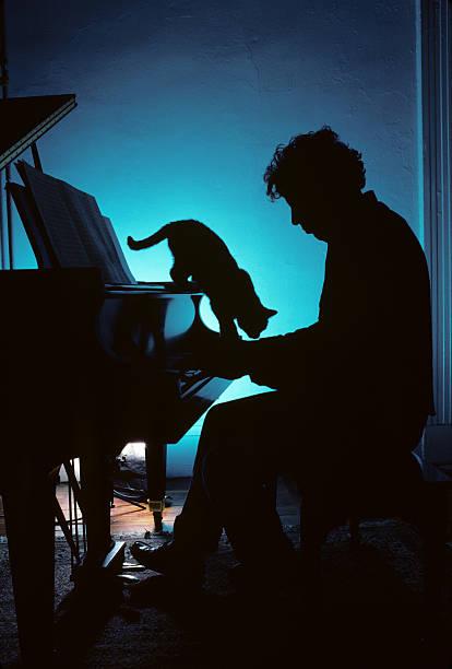 dean_frey's tweet photo. And, especially for #caturday, Ebet Roberts' shot of Philip Glass and a friend, from 1987 https://t.co/kqWccIOpmw