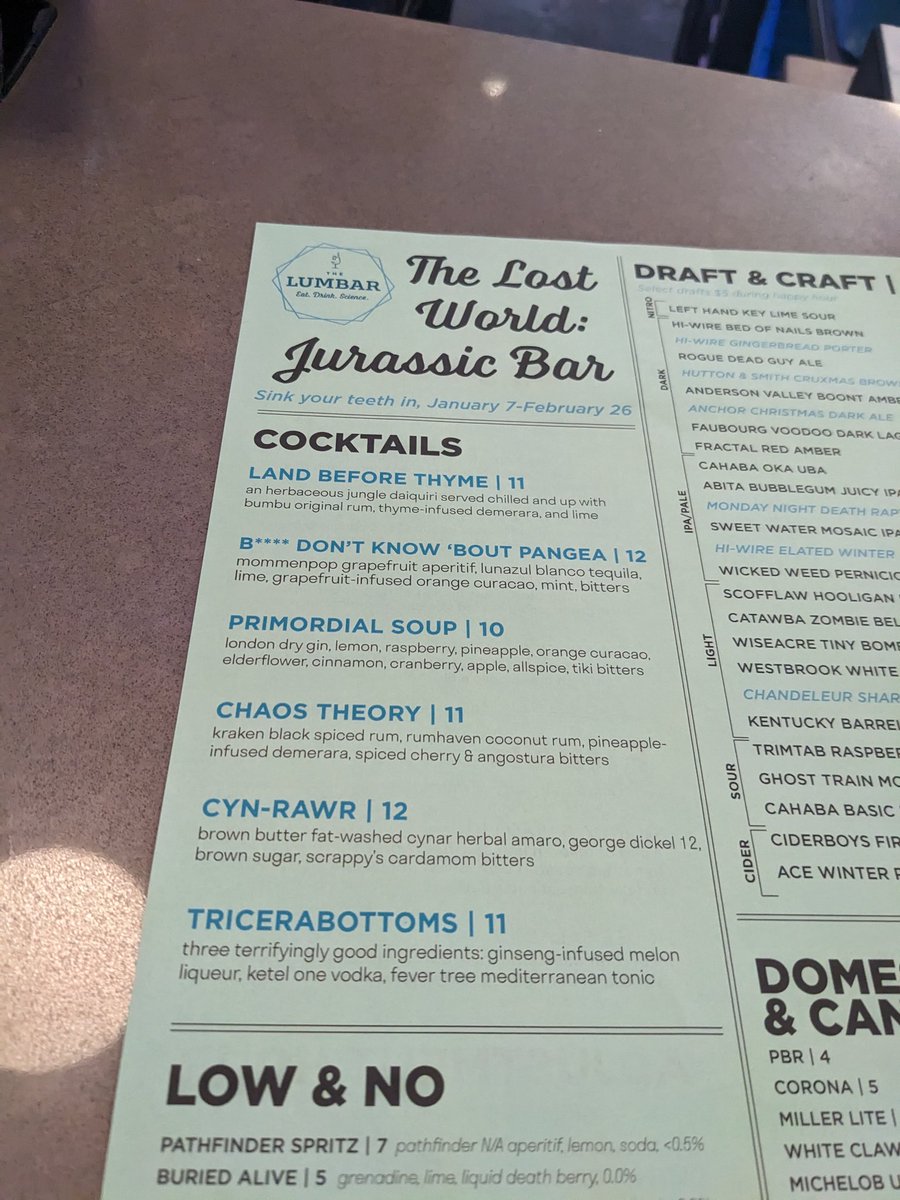 AckermansNicole's tweet photo. I just randomly walked into a women-owned science themed bar with a Jurassic-themed menu?!?!? https://t.co/qYjaFCgidM