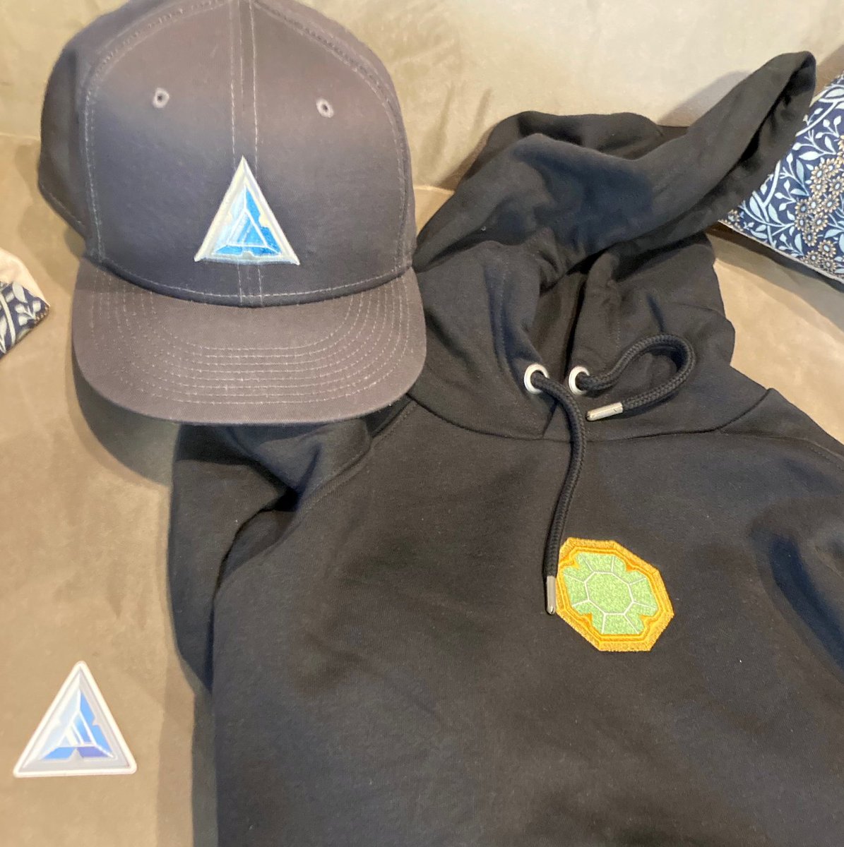 DFKgrandote's tweet photo. The merch arrived! Let's go @DeFiKingdoms  2023! #dfkmerch https://t.co/rvJ3zYQqNU