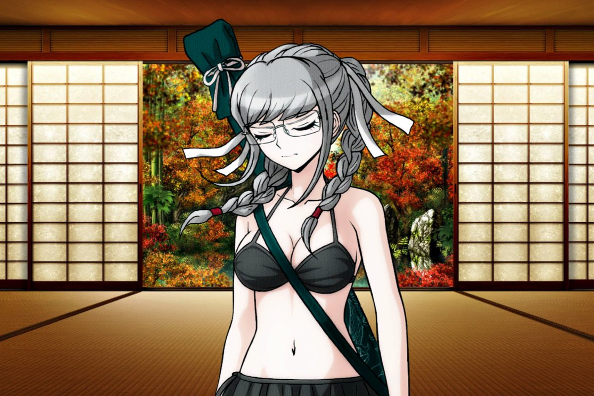 Existing on the beach, meditating on it as the vaguely chill wind blows against her. . .