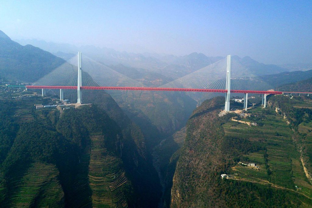 12. Duge Bridge, China (2016)

Not the tallest but the *highest* bridge in the world - its road deck is an astonishing 565 metres above the Beipan River.