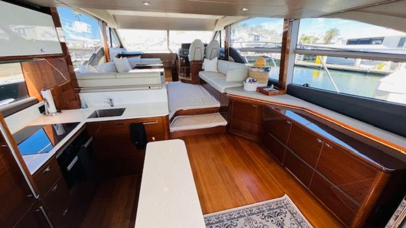 SkipperBuds's tweet photo. A highly competent yacht in every area, the open plan interior of the 2019 Princess F55 is an impeccable blend of American walnut furniture, recessed LED lighting, and clever innovations. 
Shop this boat on our website: https://t.co/os8YyRffyP 
#princessyachts #yacht #yachting https://t.co/gRA97s0wFa
