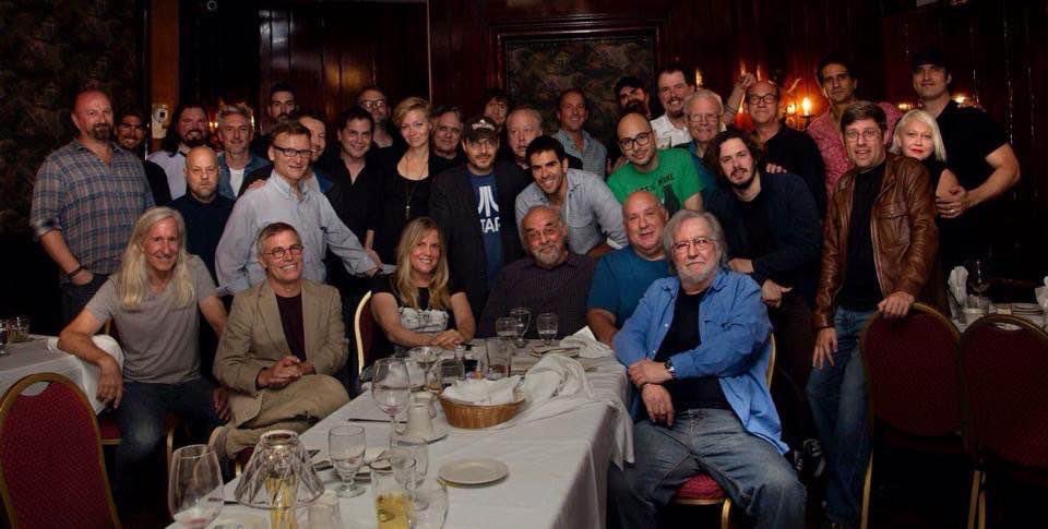MickGarrisPM's tweet photo. One of the most memorable Masters of Horror dinners, with two of our beloved fallen heroes at the center of the action, where they belong. How many do you recognize? https://t.co/jNtrj7wczc
