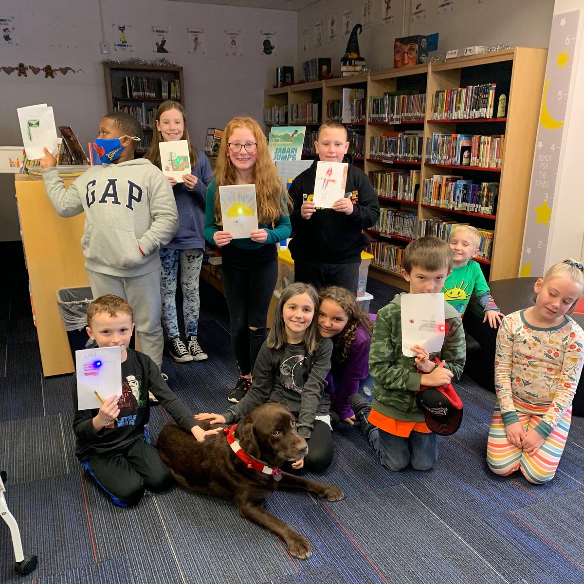BigCrossLibrary's tweet photo. In December, 4th grade lit up the library with circuits. They designed and created cards using copper tape, batteries &amp; LED bulbs. Thank you, Mrs. Dumar, for the circuit PD that helped make this lesson so successful! @krslibrary @gftechteam @krislynnd @bcelemprincipal #STEAM https://t.co/yEWVTVG9cD