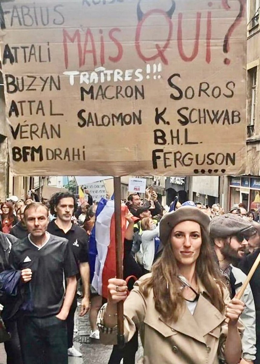 tcabarrus's tweet photo. Dans la manif parisienne des #GiletsJaunes, cette jeune femme complotiste, qui se dit #soignante #antiVax, fait référence à une enseignante d'#extremedroite, #CassandreFristot, condamnée pour avoir porté une pancarte #antisemite dans un cortège à #Metz. https://t.co/LMsIDNivTx
