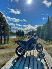 Obedmose3's tweet photo. I’ve lost count of the days, this adventure keeps on giving. A change of scenery arriving in Sweden and today I’ve done my first small stretch of the Swedish TET route and I am hooked!! 🤩 
Also, the bike is bloody awesome! 😍 https://t.co/OrD7cJAi4q