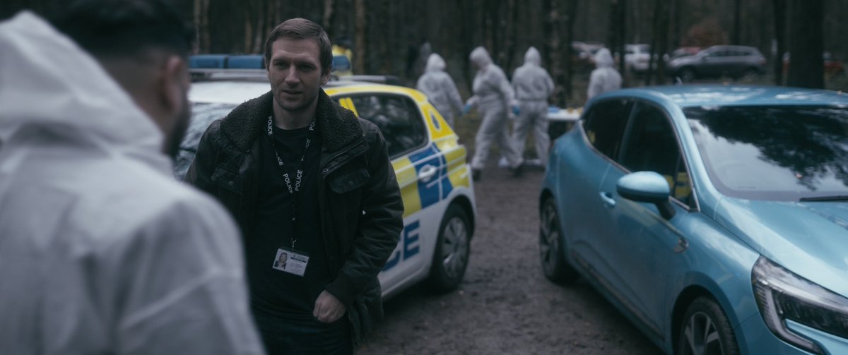without_favour's tweet photo. A still from the feature film.

DS Mark Hudson played by talented @johnloveactor  arrives at the grisly crime scene and is greeted by DC Taj Bukhari played by Tahir Shah @1TahirShah

Directed by Jonny Dixon at @isaacwhouk https://t.co/nOl51PCnDG