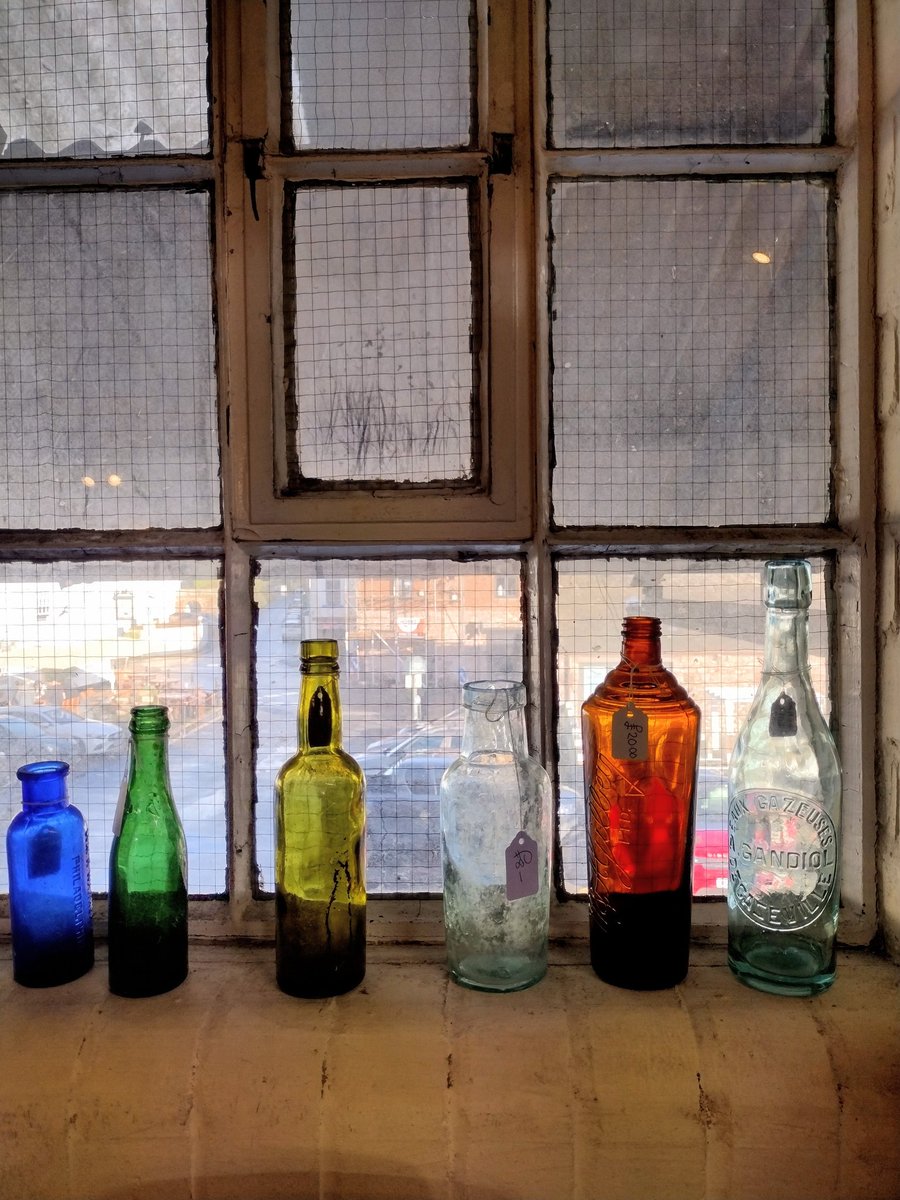 Some bottles in a window but you can see that and the artistic credit is with the person who arranged them #SundayStory