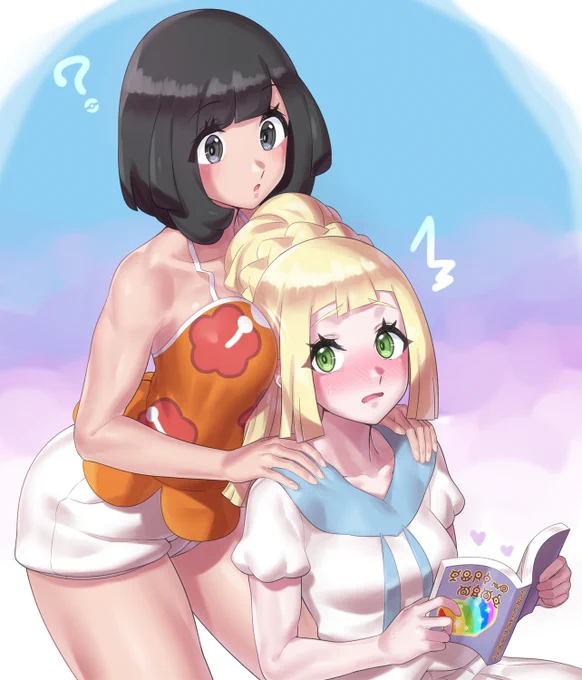 本の内容が気になるミヅキと頭に当たっている柔らかいモノが気になるリーリエ 
