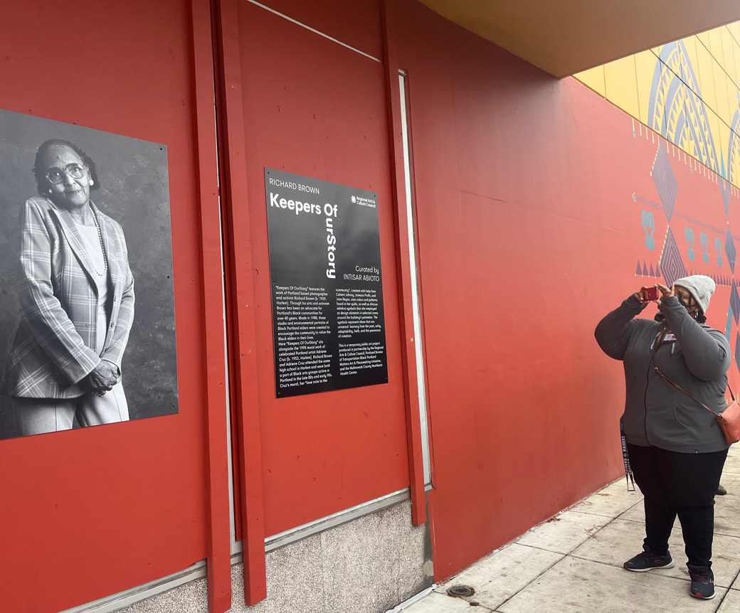 MultCoHealth's tweet photo. Last week we visited 3 art installations outside the Northeast Health Center. Portraits of Indigenous Portlanders from #WeAreTheLand, photos of Black elders by Richard Brown, and an African-themed mural by Adriene Cruz. @indigenaio @blackportlander @multco @oregonmetro https://t.co/eOVqn4Z3Av