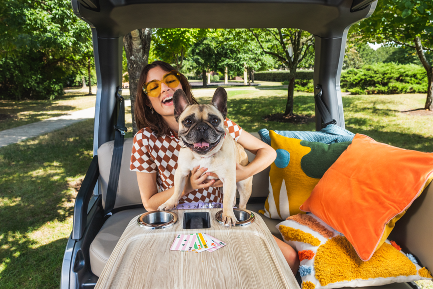 clubcar's tweet photo. Winston LOVES his rides in the CRU. Let's see your furry friend loving their Club Car outings! https://t.co/l9D6Yzga61