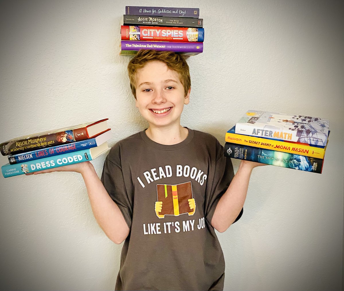 @MGBookVillage Hi #VillagePageTurners, I'm E Train, an 11 (12 tomorrow) year old #literacyadvocate, podcast host, #author interviewer, and ferocious reader! I love #MGLit & can't wait for what's in store for 2023 in the #kidlit world!