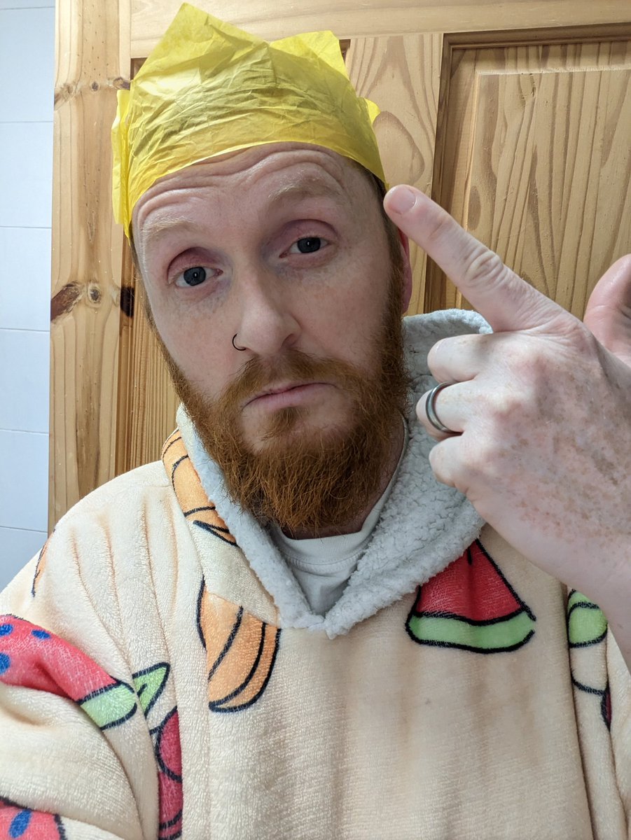 So, the annual "whoever keeps their Christmas-cracker twat-hat on for the longest is the winner" game has gotten a bit extreme this year. 29 hours and counting. 
#christmasday2022