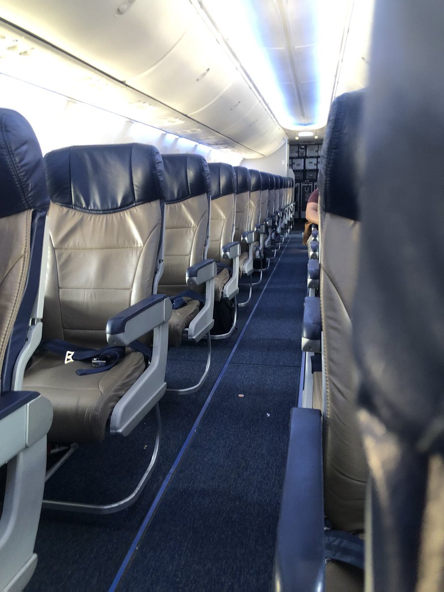 MeganMary2's tweet photo. Literally LOLing at how empty our flight from Chicago to Nashville today was @SouthwestAir what are you doing https://t.co/8YFwgpwBoV
