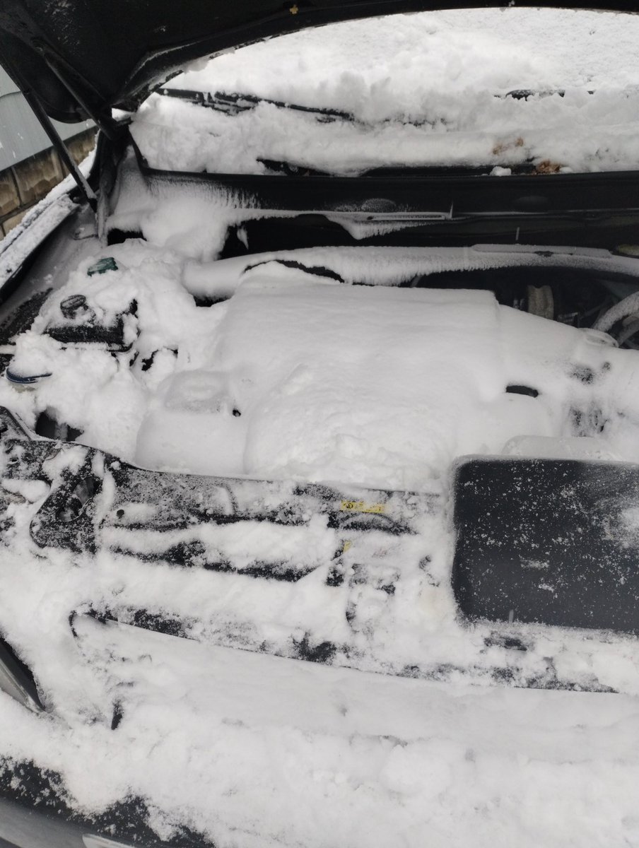NesVvs's tweet photo. I've been driving since let's say 16, owned numerous vehicles but never and I mean ever have I seen snow go through a grill and freeze my engine 😡🤬🤬🤬🤬🤬🤬
-SOMEBODY TELL ELSA, JACK FROST OR FROSTY TO MEET ME AT NORTH TOWN VOLVO 🤬🤬🤬
#NesVvs 
#blizzard2022 https://t.co/yQWT4D4X5p