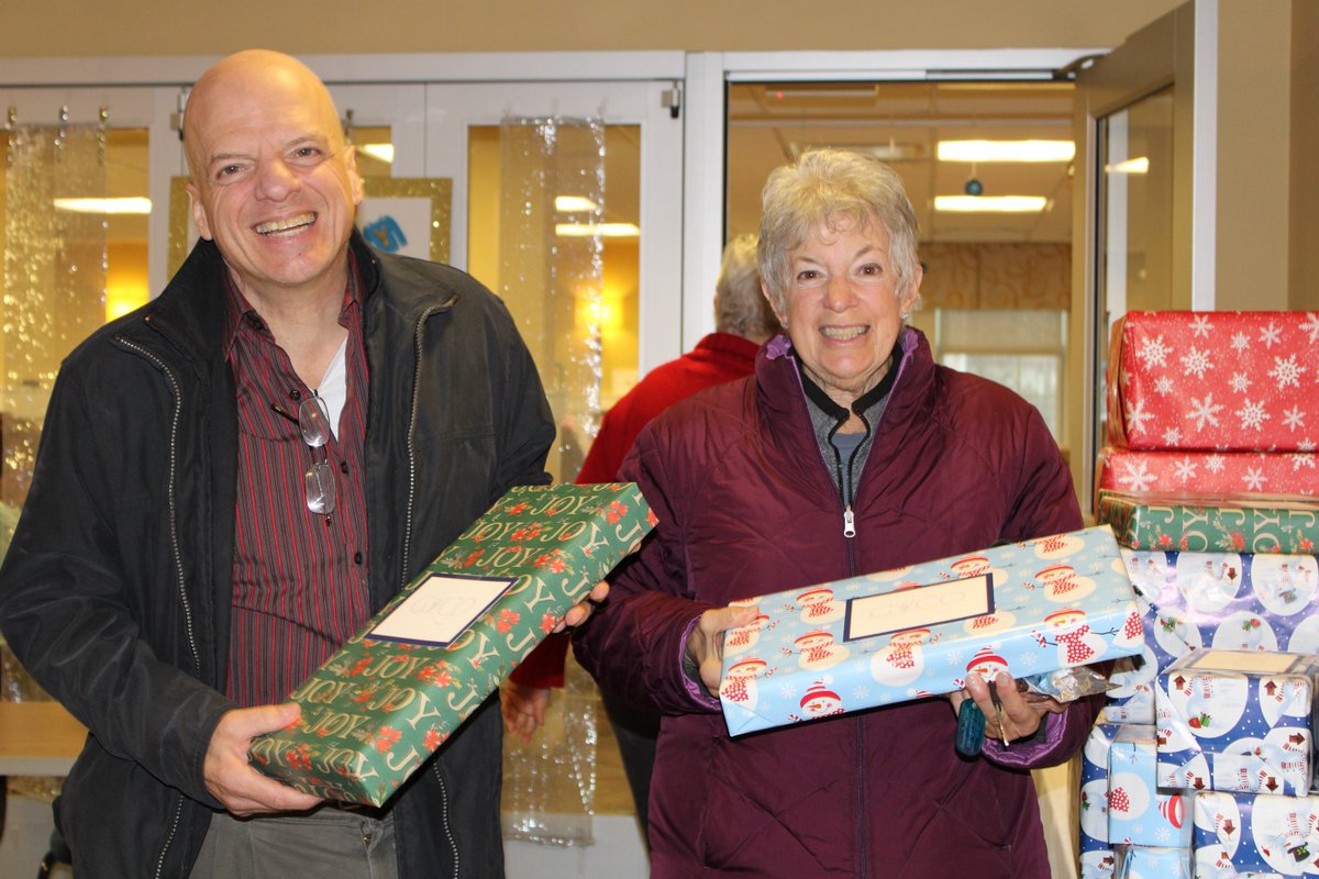 SurreyServices's tweet photo. Thank you to @GVCOorg for ensuring Surrey members had gifts to open this holiday season. Quite a few members said they related to little kids shaking their presents to try and guess what was inside. We hope everyone is enjoying their holiday season!❄️🎁 #SurreyServices https://t.co/qdG8OEbpds