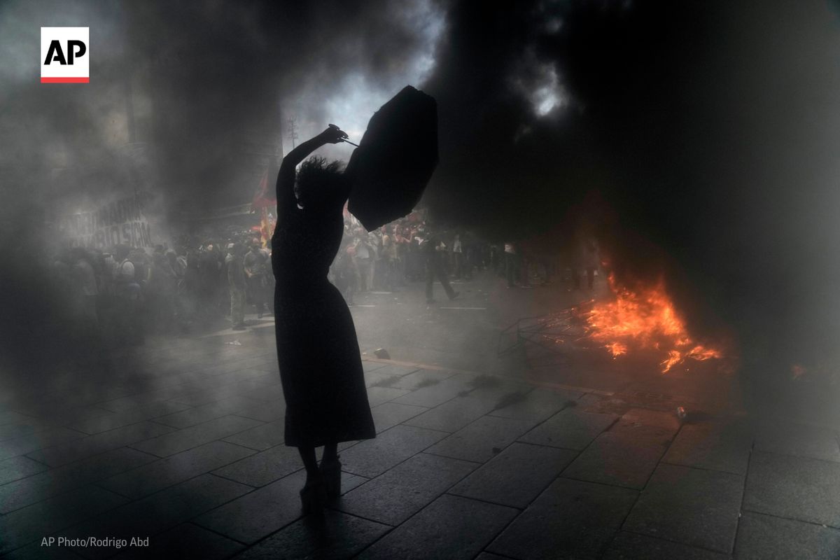AP's tweet photo. The best images taken in 2022 by @AP photographers in Latin America and the Caribbean reveal the reality of migration, poverty and violence, but they also showcase the region’s intense, vibrant and colorful daily life.

https://t.co/gwLeDhbn5x https://t.co/85rBoR70sk