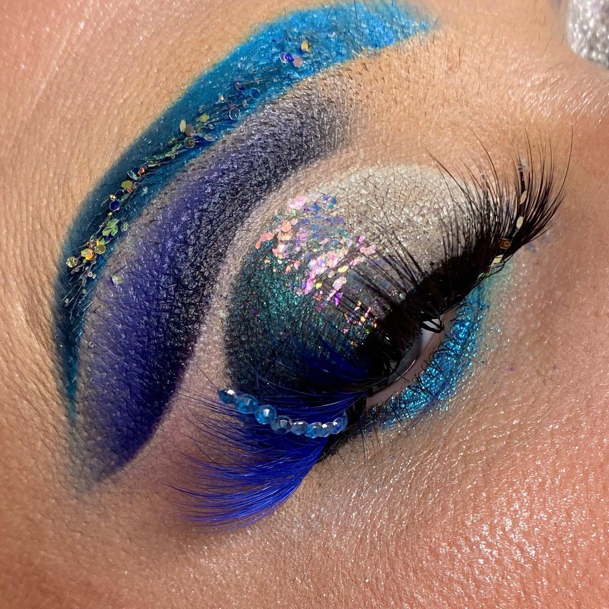 I’m not sure if it’s the duo chrome flakes that set it off or the rhinestones I glued to my lashes.