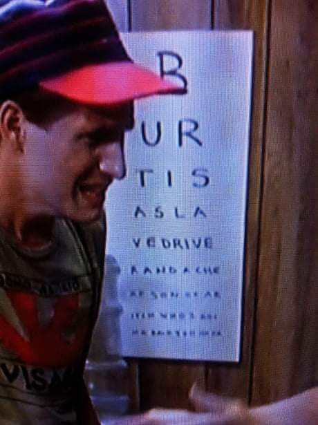 From "Return of the Living Dead": 
The eye chart poster in Frank's office, which reads, "Burt is a slave driver and a cheap son of a bitch who's going bald too ha ha"
#zombieapocalypse 
#zombiegames