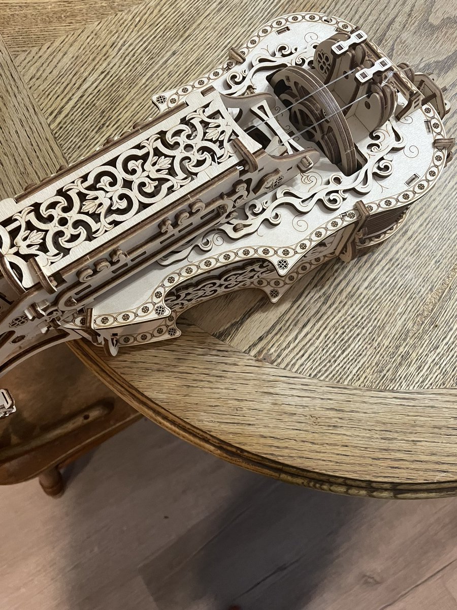 SuperlinkJ12's tweet photo. Got one of those gimmick printed hurdy gurdys that you gotta put together 😂 I’m no good at it, and I messed up a bit on the drone string, but the mechanics are there. It even came with rosin, despite using fishing line strings. Still, it was a fun project to do! hard to turn tho https://t.co/1K5oXWblHc