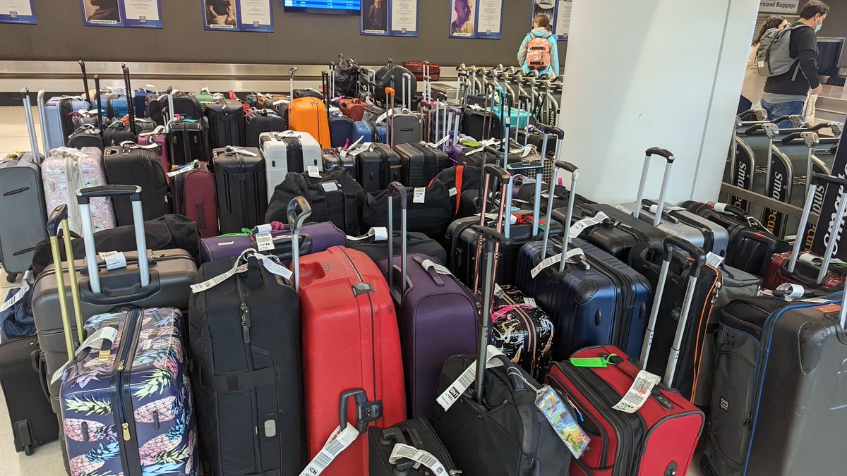 schwerdo's tweet photo. @SouthwestAir We thankfully got home on our booked flight after a mere 2 hour delay.  Nowhere near as bad as most.  And our bags made it as well.  However, if this is what ONT looks like, I can't imagine what major airports look like. And why are there a bunch of LAX tagged bags here? https://t.co/c1NbEoU543