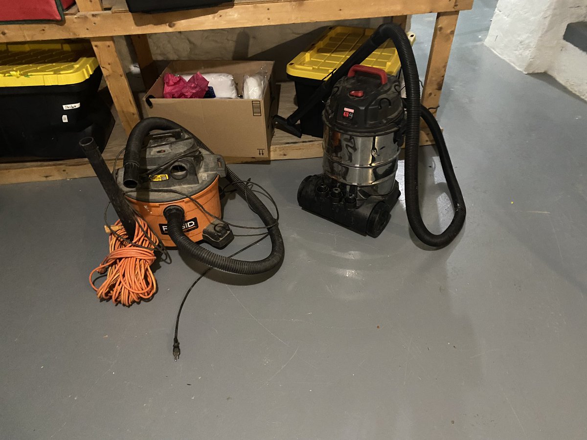 Beags_Beagle's tweet photo. Settled in for movie night 😊 until…we hear 💦 water! Track it down in the basement (burst pipe). Glad we have a wet vac! Maintenance shows up with a wet vac the size of a thimble 🤦🏾 (orange one). Needless to say, spent hours cleaning up water 😩 #goodnight https://t.co/onx4oCAuct